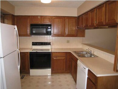 Kitchen has lots of space and is fully applianced.