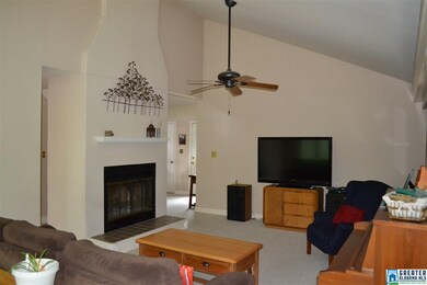 Gorgeous wood-burning fireplace with an adobe-like