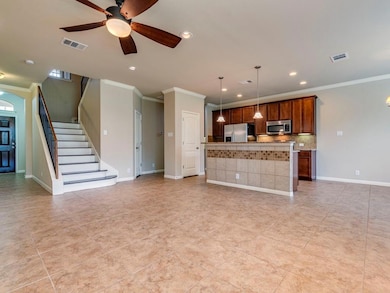 Unfurnished living room with ornamental molding, 