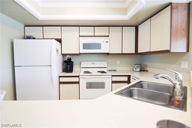 Double stainless sink, lots of cabinets. Seller is