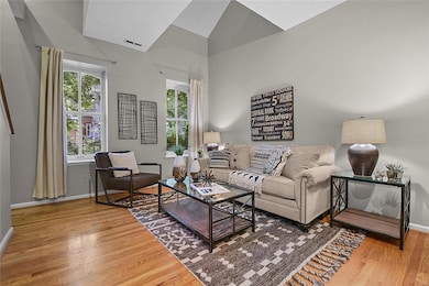 Beautiful hardwood floors and soaring ceilings mak