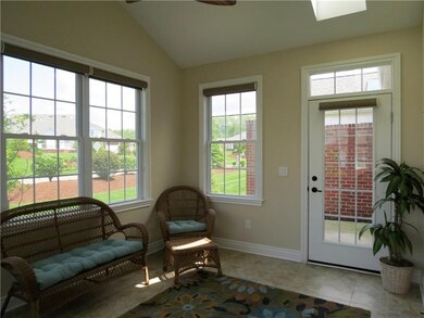 THE MORNING ROOM IS OPEN TO THE KITCHEN LEADS OUT 
