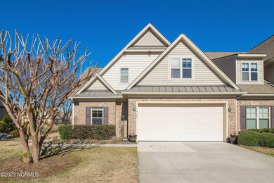 CORNER END UNIT W 2 CAR GARAGE