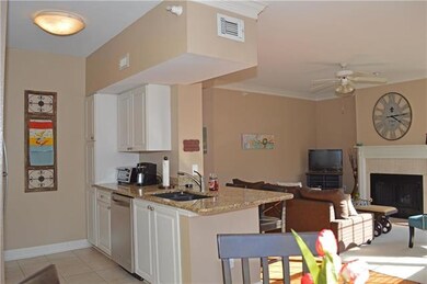 Plenty of cabinets and eating bar
