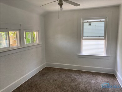 Bedroom.  New windows and walk out to airing deck