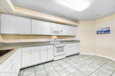 301 N Atlantic Ave unit 303, Cocoa Beach, FL 32931 - photo 7