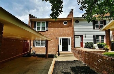 View of front of property with brick siding