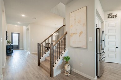 Stairway featuring light hardwood / wood-style floors