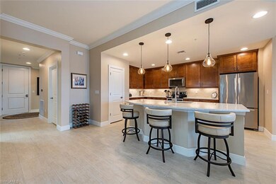 Open kitchen with large island and pantry, stainle