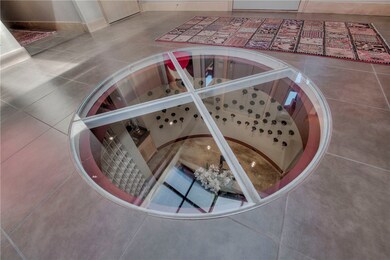 Glass floor look into Wine Room