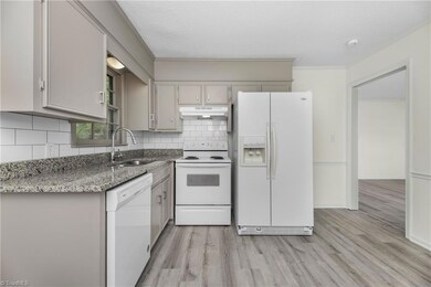 Kitchen with granite countertops