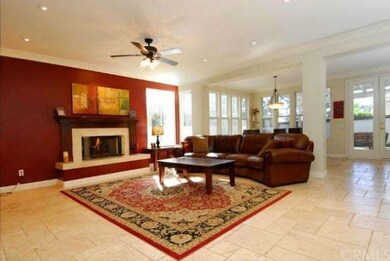 Large family Room with Fireplace opens to breakfas
