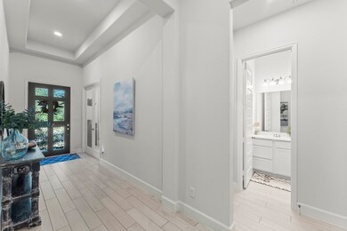 The wood-look tile throughout the main areas of the home is not only durable but easy to maintain.