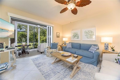 Tiled living room with ceiling fan