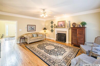 The great room is large enough for your kingsized furniture.  New wood flooring, paint, an has views to the back yard.