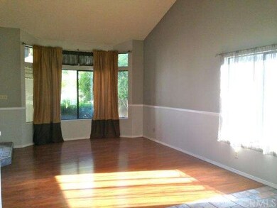 Formal Living Room with Custom Wood Laminate Wood 