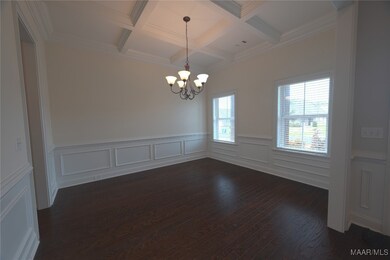 Beautiful Dining room with Coffered Ceiling
