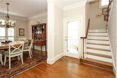 Foyer  and Dining Room...hardwoods throughout.