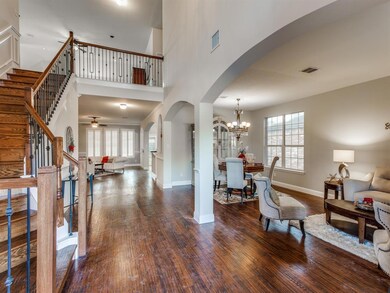 view as you enter with open, soaring ceilings
