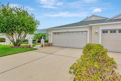 Two Car Garage/Driveway with Left Side Walkway to Front Door Entrance