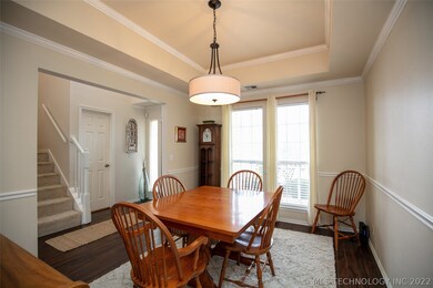 The formal dining room is large enough to accommod
