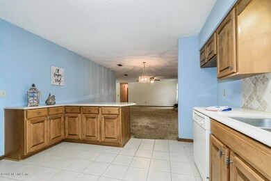 Kitchen open to Dining and Living areas