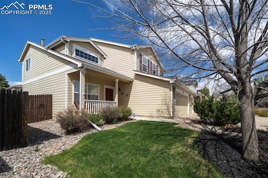 View of front of home with a porch and concrete dr