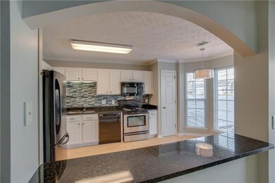 Upgraded appliances, granite counters and lots of natural light