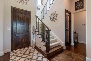 Astonishing hand scraped wood floors greet your entry!