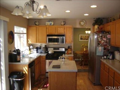 Kitchen with stainless steel appliances.
