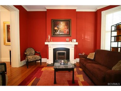 Living room fireplace with custom made mantel matc