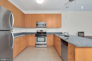 Village Lofts unit 320, Baltimore, MD 21218 - photo 3