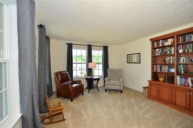 Enter the Library through double French Doors to c