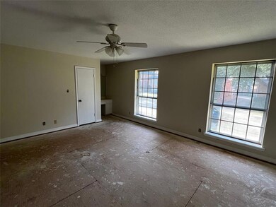Bedroom 1 with a desk nook, two closets and a full