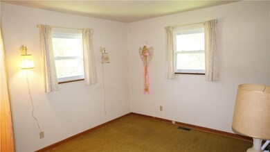 Bedroom. Hardwood floors under carpet
