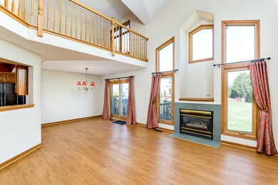 Cathedral ceilings, fireplace and open staircase t