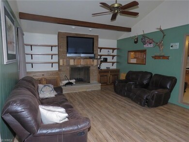 The wood fireplace also has a gas line. The lamina