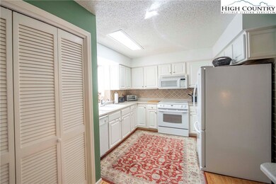 Efficient kitchen with lots of cabinets
