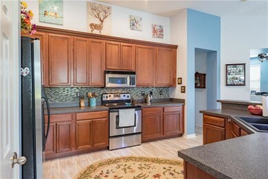 Kitchen with lots of storage in the tall upper cab