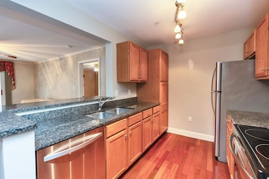 265 Edward J Roy Dr unit 207, Manchester, NH 03104 - photo 6
