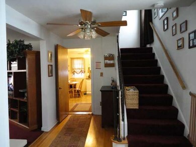 Other. foyer with hard wood flooring.  1/2 bath on