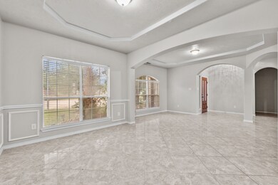 From the formal dining area, look back upon the tw