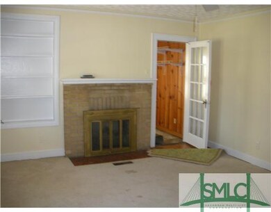 Living Room. Original hardwood floors are under th