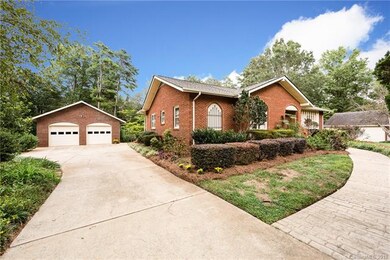 Over sized 2 car detached garage has new doors