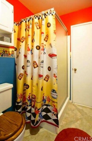            First level bathroom includes tile floo