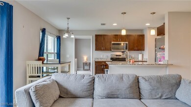 Living room featuring recessed lighting and a chan