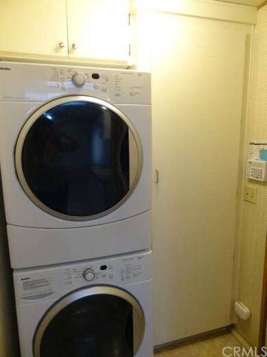 Stackable washer/dryer included. Alarm system inst