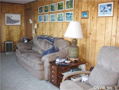 Living Room. All furniture and all TVs included wi