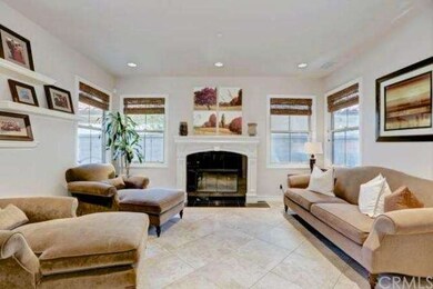 Living Room with Marble Fireplace