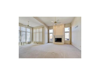 Large great room with gas fireplace, access to the